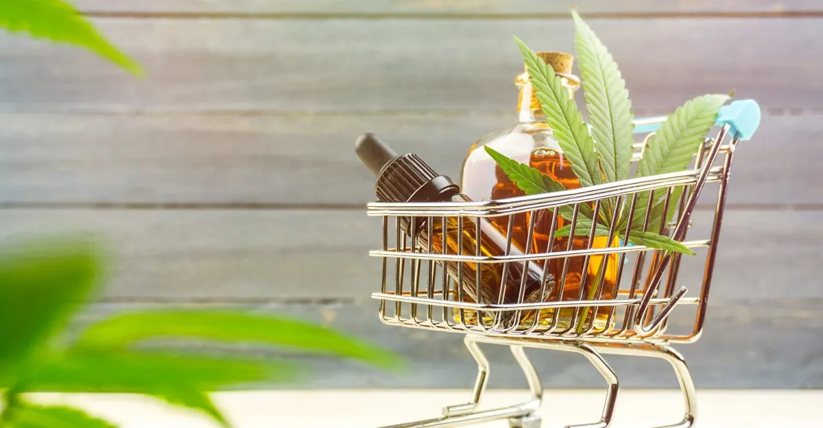 Panier de supermarché avec huiles de CBD pour le bien-être